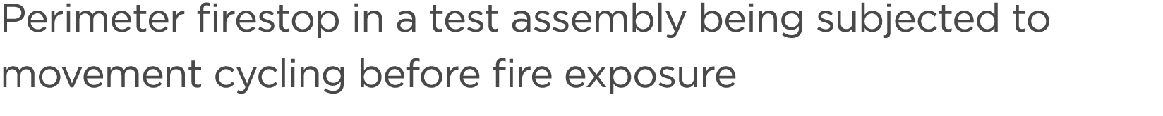 Perimeter firestop in a test assembly being subjected to movement cycling before fire exposure 